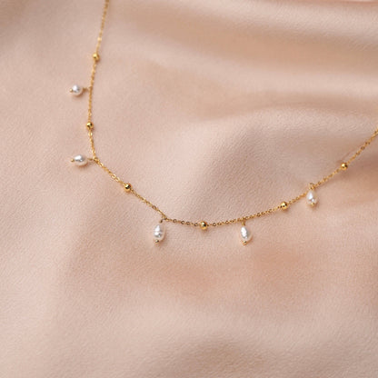 Collier acier chaine billes perles d'eau douce nacre